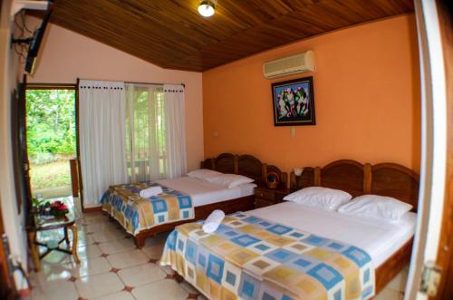 Katil atau katil-katil dalam bilik di Hotel y Restaurante Las Tablitas