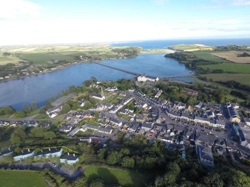 an aerial view of a town next to a body of water at Croi an Bháile Luxury Apartment in Rosscarbery