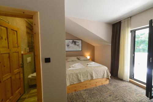 Cama o camas de una habitación en VIR Villa