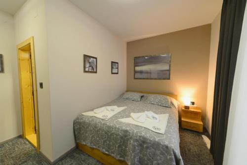 Cama o camas de una habitación en VIR Villa