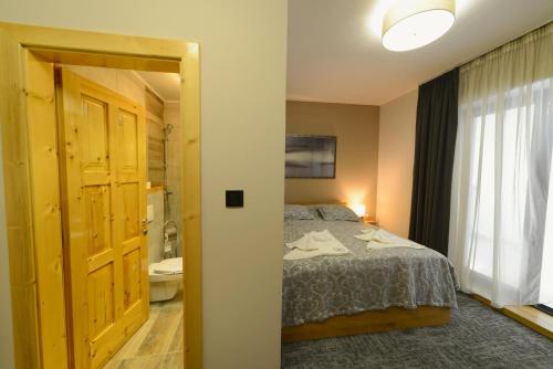 Cama o camas de una habitación en VIR Villa