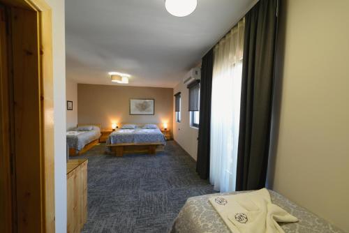 Cama o camas de una habitación en VIR Villa