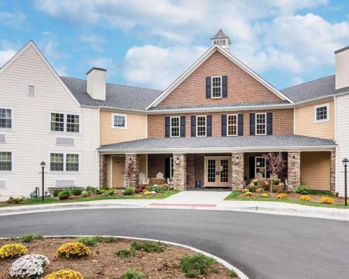 a large house with a driveway in front of it at Bluegreen Vacations Shenandoah Crossing, an Ascend Collection Resort in Gordonsville
