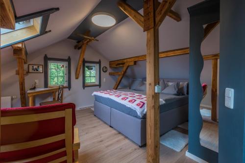 Cama ou camas em um quarto em Ferienwohnung „Kleine Liebe“