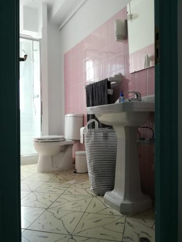 a bathroom with a sink and a toilet at Casa Oroela in Jaca