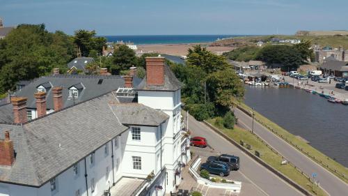 an aerial view of a white house and a river at The Falcon Hotel in Bude