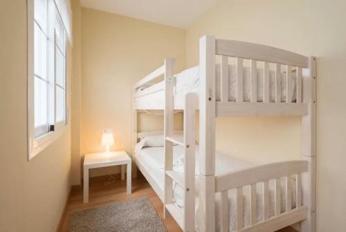 Posteľ alebo postele v izbe v ubytovaní Shiny Lud Family Apartment