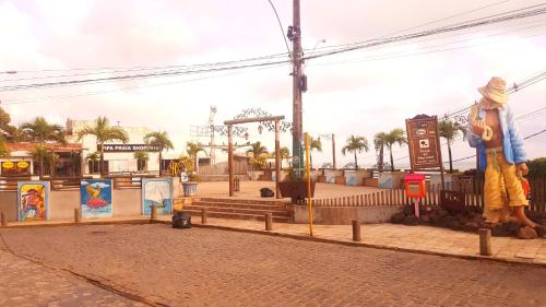 a street corner with a park with a playground at La Estacion Hostel - Pipa in Pipa