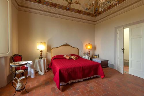 Ένα ή περισσότερα κρεβάτια σε δωμάτιο στο Agriturismo Villa Ulivello in Chianti