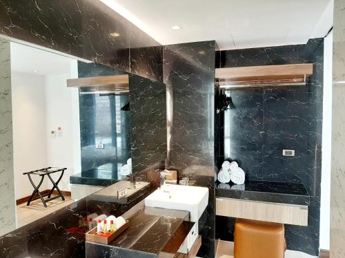 Ванна кімната в Sacha's Hotel Uno SHA