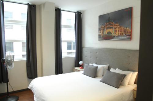 Cama o camas de una habitación en 91 Loop Boutique Hostel