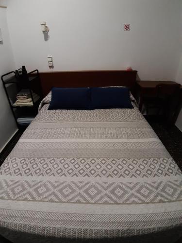 Postel nebo postele na pokoji v ubytování Pensíon Lucia