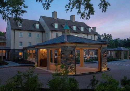 a large building with a gazebo in front of it at Boar's Head Resort in Charlottesville