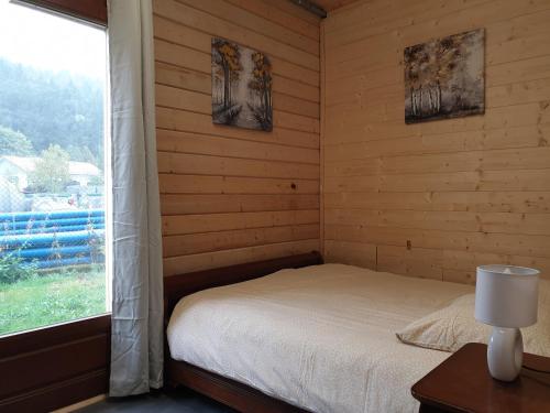 Postel nebo postele na pokoji v ubytování Romann
