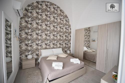 Ένα ή περισσότερα κρεβάτια σε δωμάτιο στο La VILLA