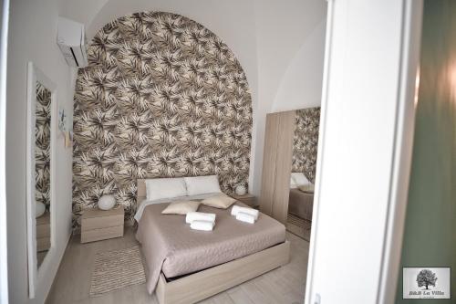 Ένα ή περισσότερα κρεβάτια σε δωμάτιο στο La VILLA