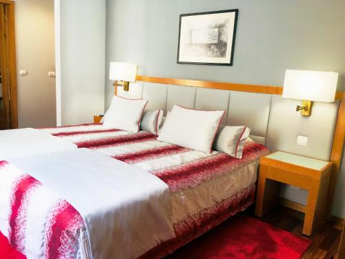 Кровать или кровати в номере Hotel Boa - Vista