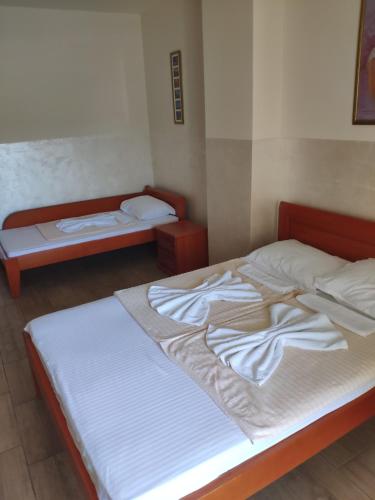 Ένα ή περισσότερα κρεβάτια σε δωμάτιο στο Apartments Stević - Monaco