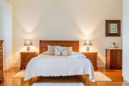 Ένα ή περισσότερα κρεβάτια σε δωμάτιο στο Casa do Outeiro