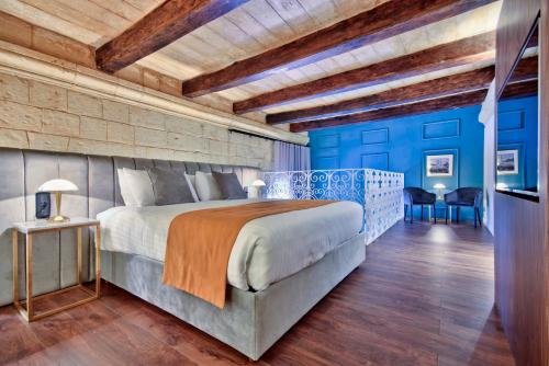 Ένα ή περισσότερα κρεβάτια σε δωμάτιο στο 23 Boutique Hotel