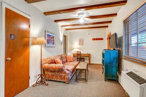 a living room filled with furniture and a window at Santa Fe Motel & Inn in Santa Fe