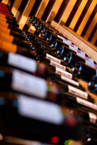 a bunch of wine bottles in a wine rack at Meiser Design Hotel in Dinkelsbühl