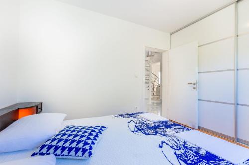 Posteľ alebo postele v izbe v ubytovaní Apartment DARIO