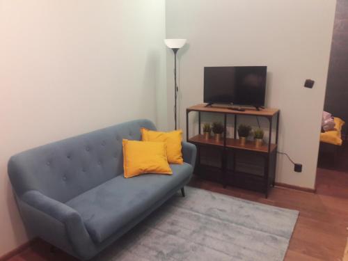 Televízia a/alebo spoločenská miestnosť v ubytovaní Apartament Santo Bartolomeo