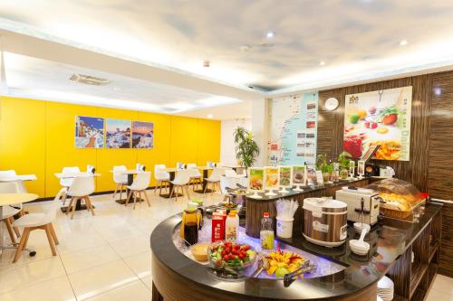 Reštaurácia alebo iné gastronomické zariadenie v ubytovaní 168 Motel-Hsinchu