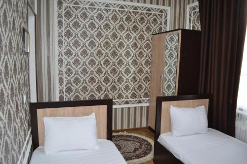 Ένα ή περισσότερα κρεβάτια σε δωμάτιο στο hostel Farovon