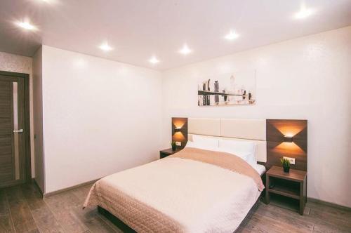Łóżko lub łóżka w pokoju w obiekcie Atma House однокомнатная квартира у Аквапарка