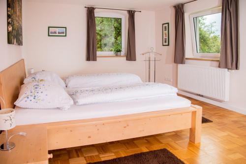 Postel nebo postele na pokoji v ubytování Ferienhof Moosing