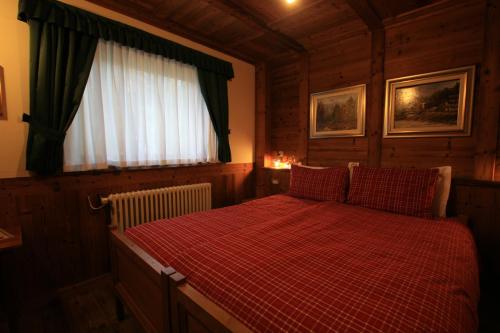 Katil atau katil-katil dalam bilik di Albergo Villa Anna Maria