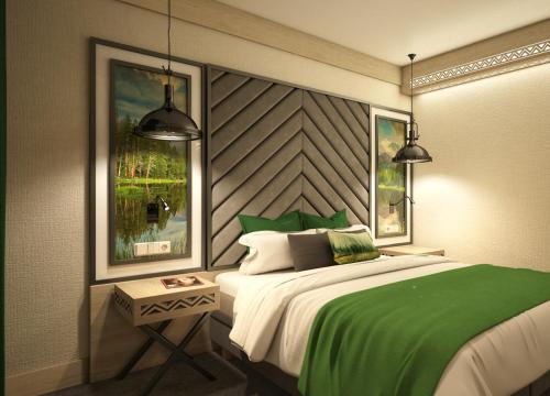 sypialnia z zielonym łóżkiem i 2 oknami w obiekcie KRYWAŃ RESIDENCE - stylowe apartamenty najwyższe opinie gości w mieście Białka Tatrzanska