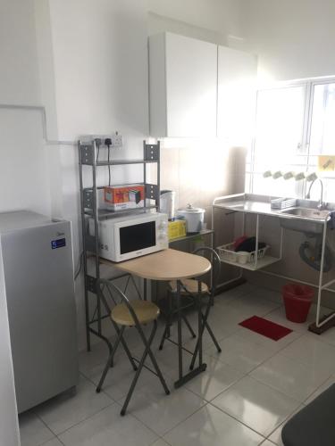 Dapur atau dapur kecil di EASTLIGHTHOMESTAY