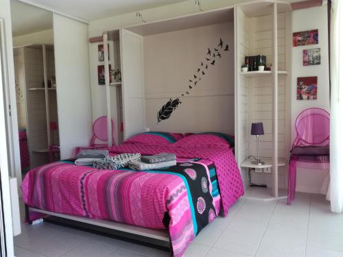 Uma cama ou camas num quarto em Location d Armelle - Moliets