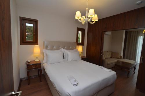 Katil atau katil-katil dalam bilik di Motali Life Hotel