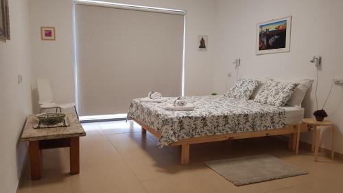 A bed or beds in a room at The Shining Star -A beautiful 3 bedroom apartment