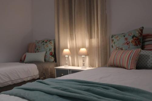 Łóżko lub łóżka w pokoju w obiekcie SHERRY HOME