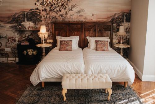 Postel nebo postele na pokoji v ubytování 1930 Boutique Hotel