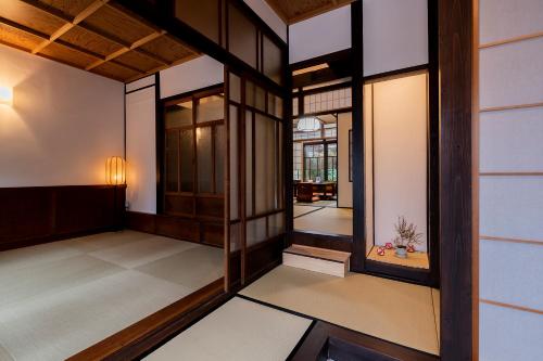 Postel nebo postele na pokoji v ubytování Mibu Momiji