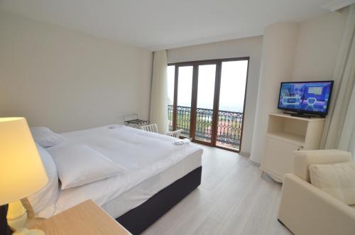 Katil atau katil-katil dalam bilik di Motali Life Hotel
