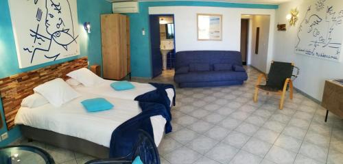 Ένα ή περισσότερα κρεβάτια σε δωμάτιο στο Chambre d'hôtes La Potinière