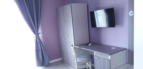 TV a/nebo společenská místnost v ubytování Borgo Palombaio 2