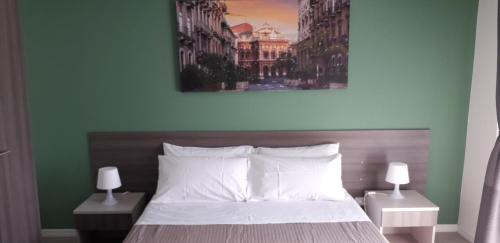 En eller flere senge i et værelse på Borgo Palombaio 2