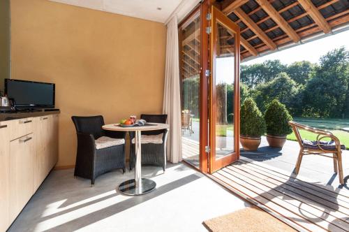 Κήπος έξω από το Bed & Breakfast de Wandhorst
