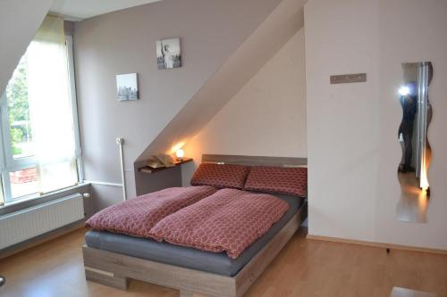 Voodi või voodid majutusasutuse Eurode grenzenlos - Drei Länder in greifbarer Nähe toas