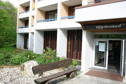 a bench in front of a building at Apartment Traube in Bad Urach