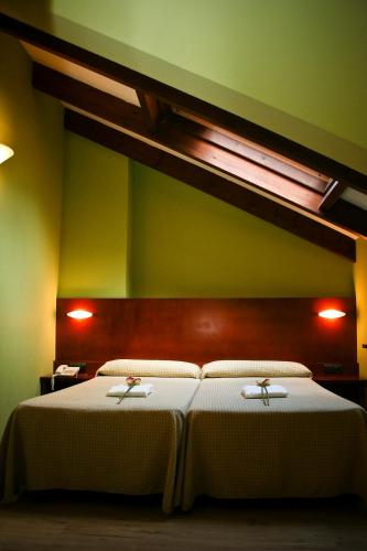 Postel nebo postele na pokoji v ubytování Hotel Torrepalacio