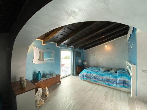 Tempat tidur dalam kamar di Paradiso Di Manù